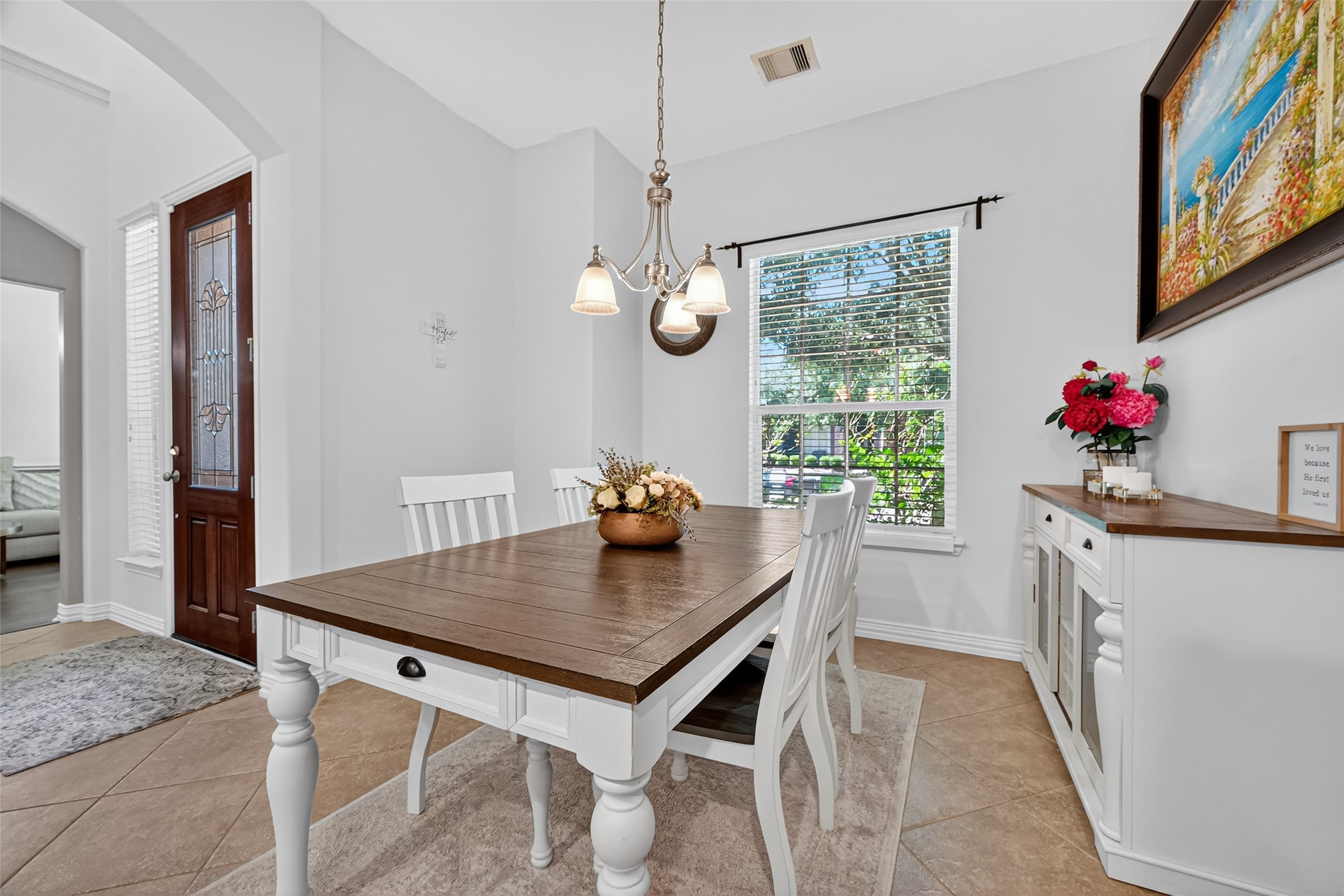 24914 Hazel Ranch Drive Katy, TX 77494 - Photo 21 of 45 a view of a dining table and chairs in a room