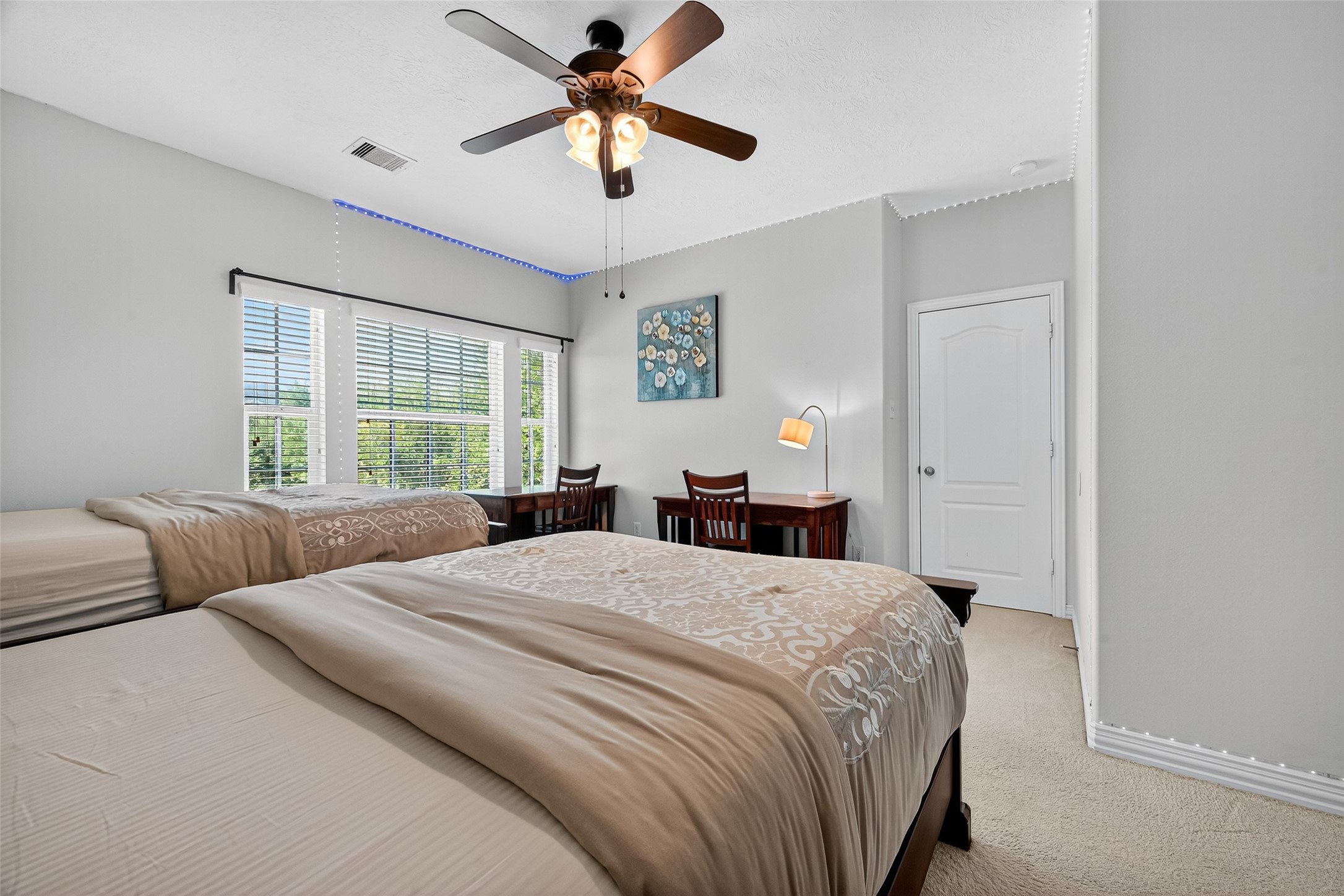 24914 Hazel Ranch Drive Katy, TX 77494 - Photo 30 of 45 a bedroom with a large bed and a window