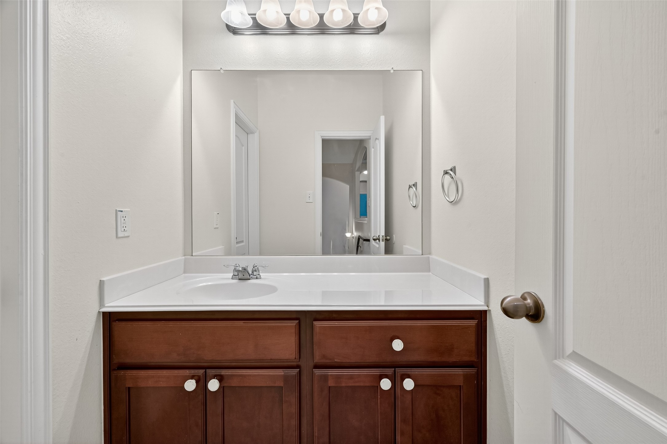 24914 Hazel Ranch Drive Katy, TX 77494 - Photo 33 of 45 a bathroom with a sink and a mirror