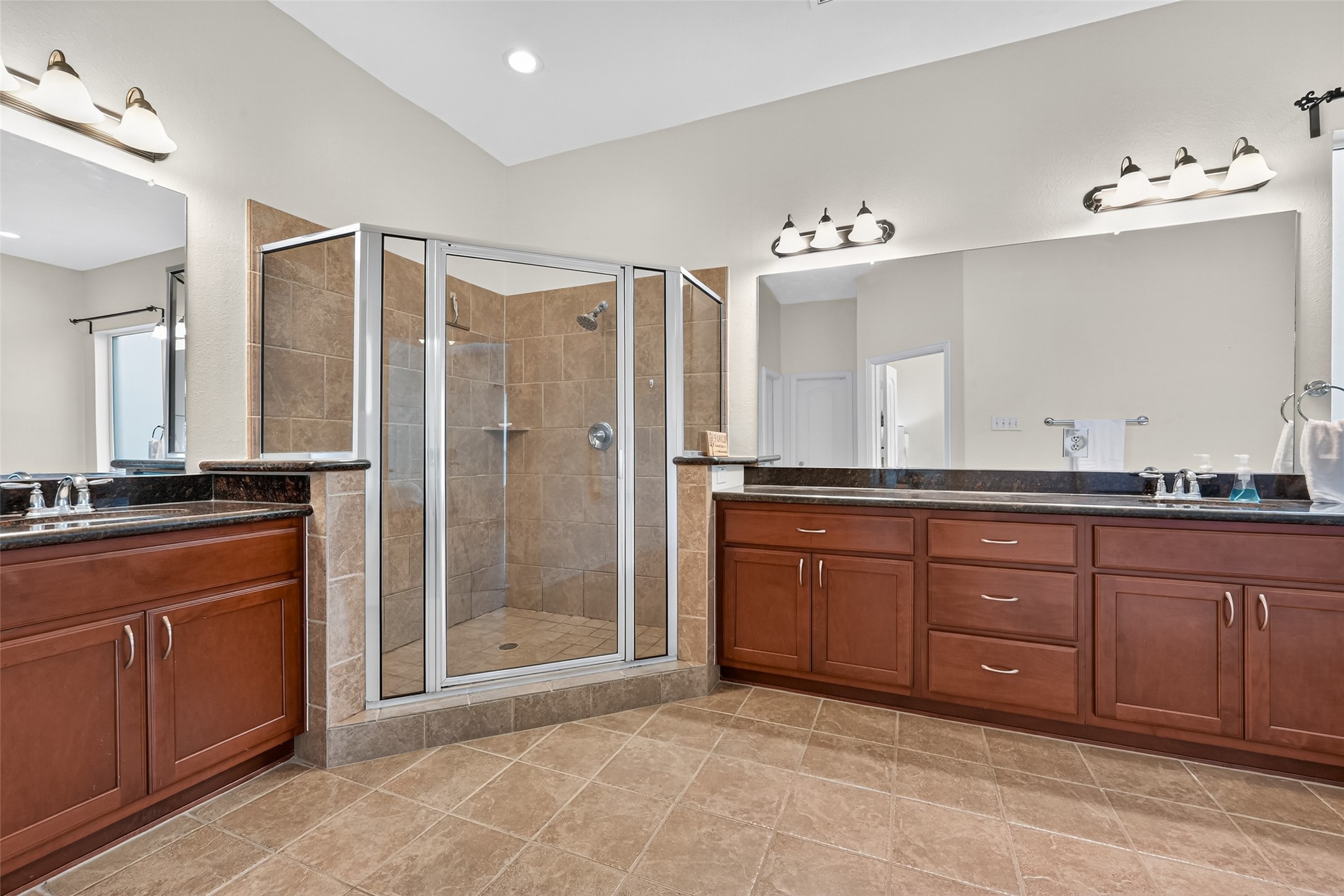 24914 Hazel Ranch Drive Katy, TX 77494 - Photo 37 of 45 a bathroom with a granite countertop sink mirror and shower