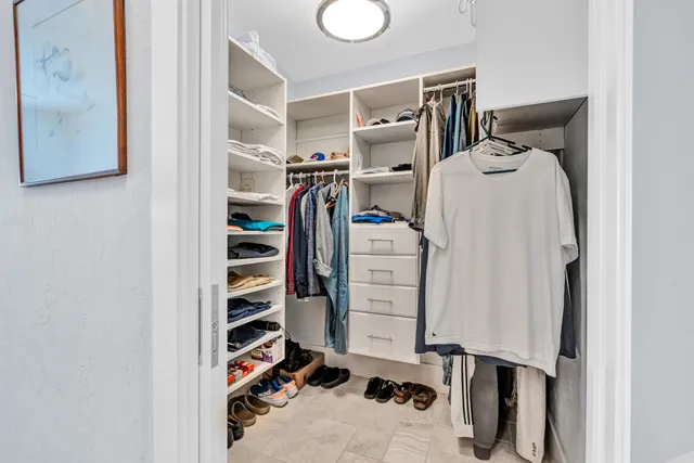 a kitchen with stainless steel appliances granite countertop a stove and a sink