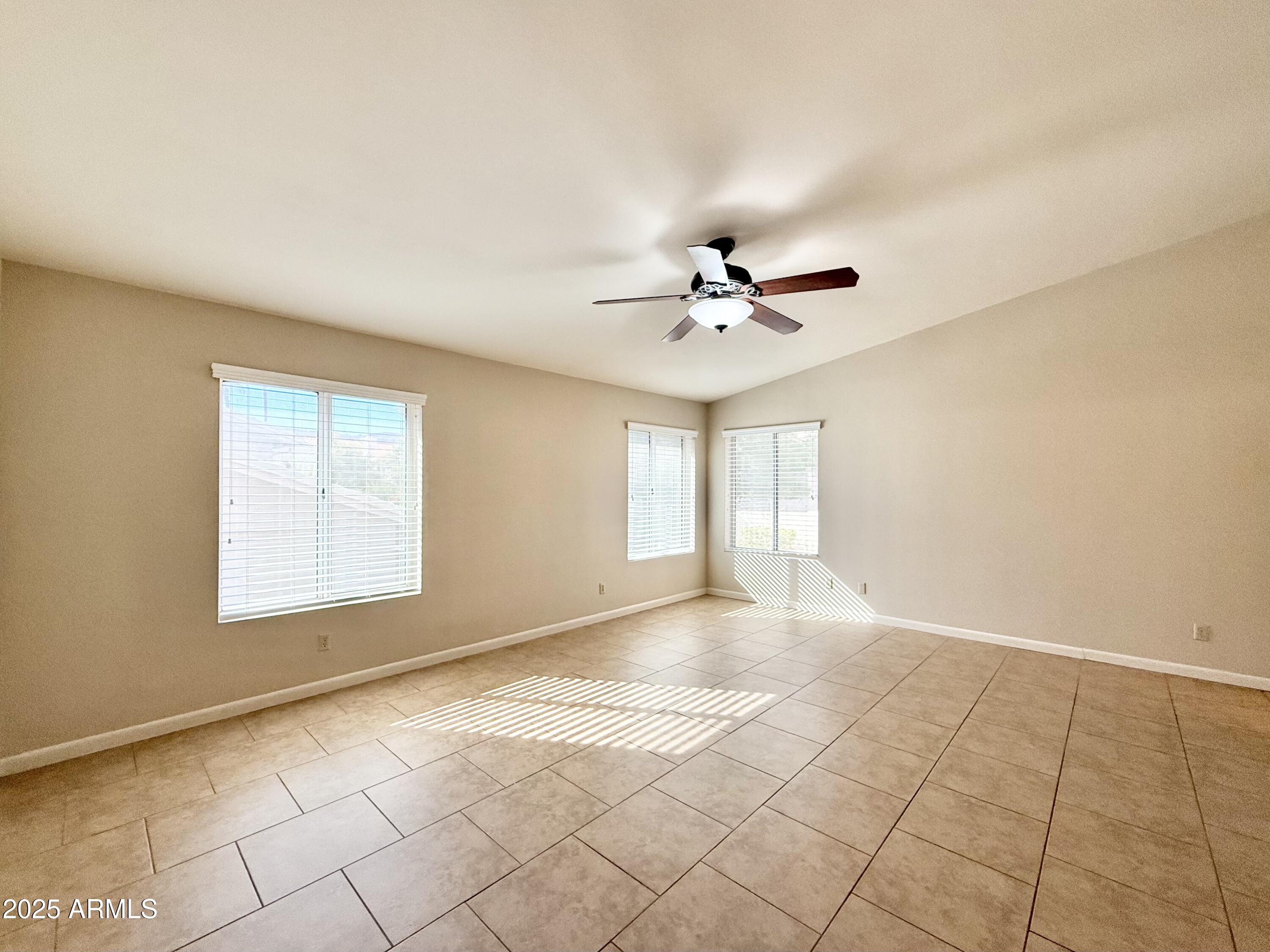 2718 East Bighorn Avenue Phoenix, AZ 85048 - Photo 16 of 31 a view of an empty room with a window