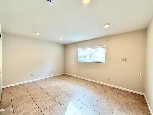 an empty room with a natural light