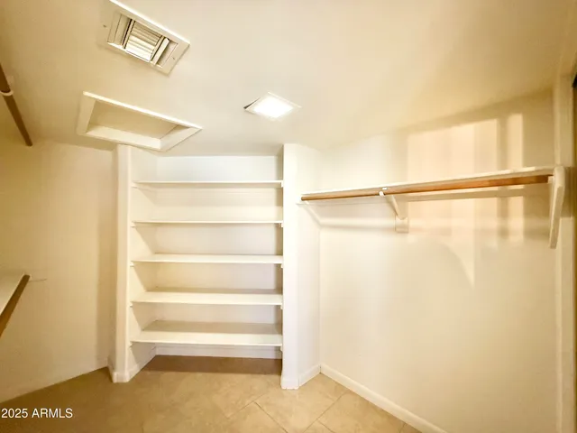 a view of a walk in closet