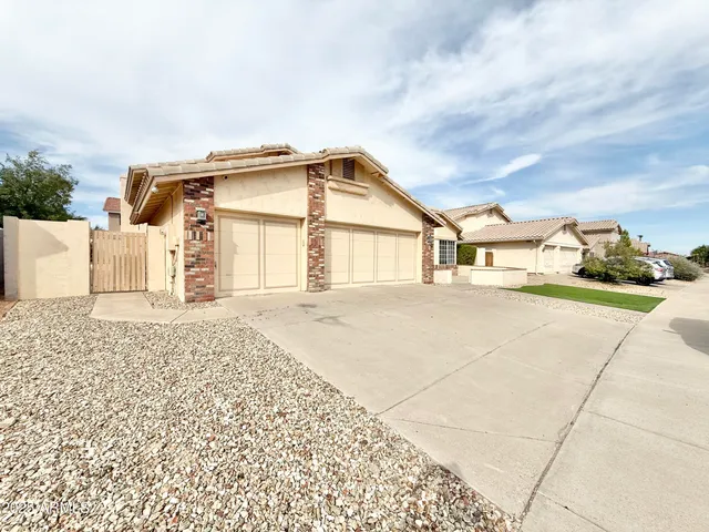 a house with trees in the background
