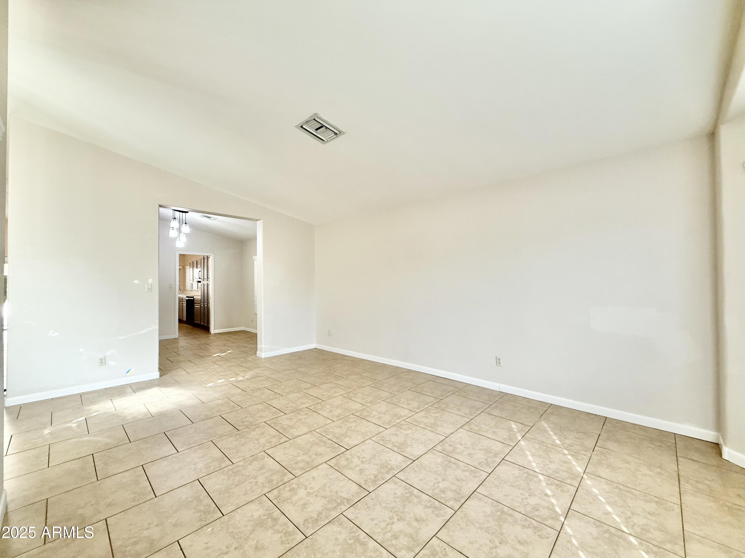 2718 East Bighorn Avenue Phoenix, AZ 85048 - Photo 10 of 31 a view of an empty room and window