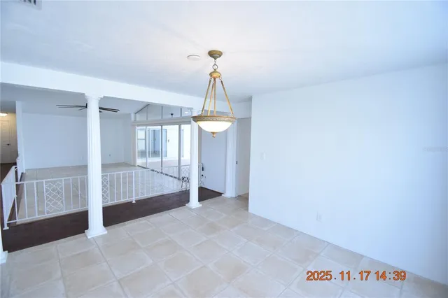 a kitchen with stainless steel appliances granite countertop a refrigerator sink and stove