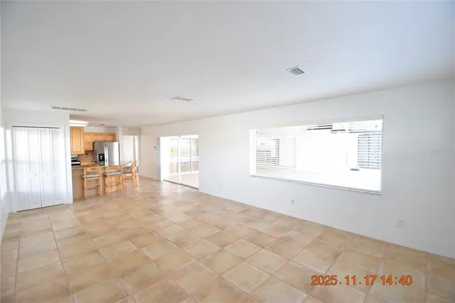 a kitchen with a refrigerator sink and microwave