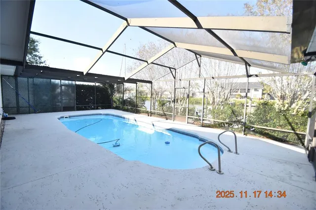 a view of a yard with snow on the road