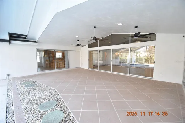 a front view of a house with plants