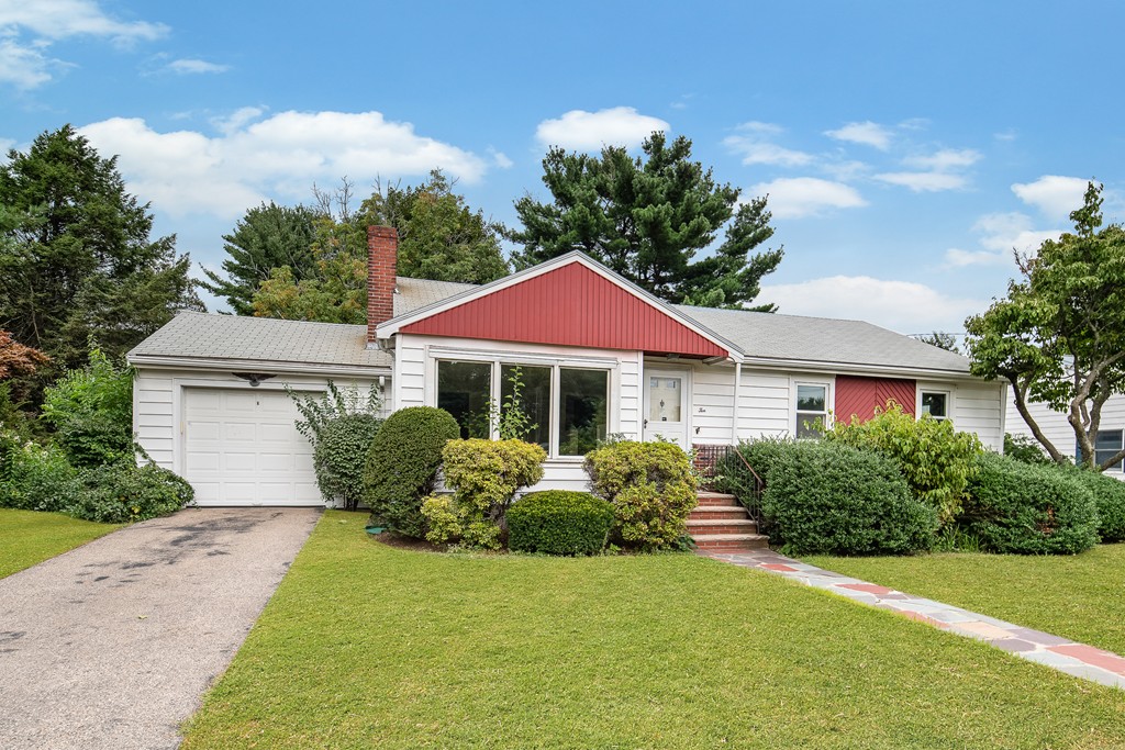 10 Wadsworth Road Arlington, MA 02476 - Photo 1 of 12 a front view of a house with a yard