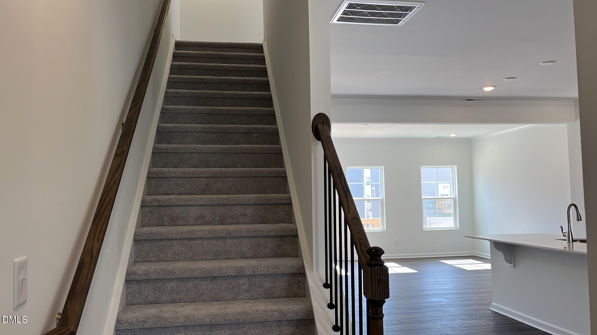 1443 Jay Road Knightdale, NC 27545 - Photo 20 of 46 a view of entryway and hall with wooden floor