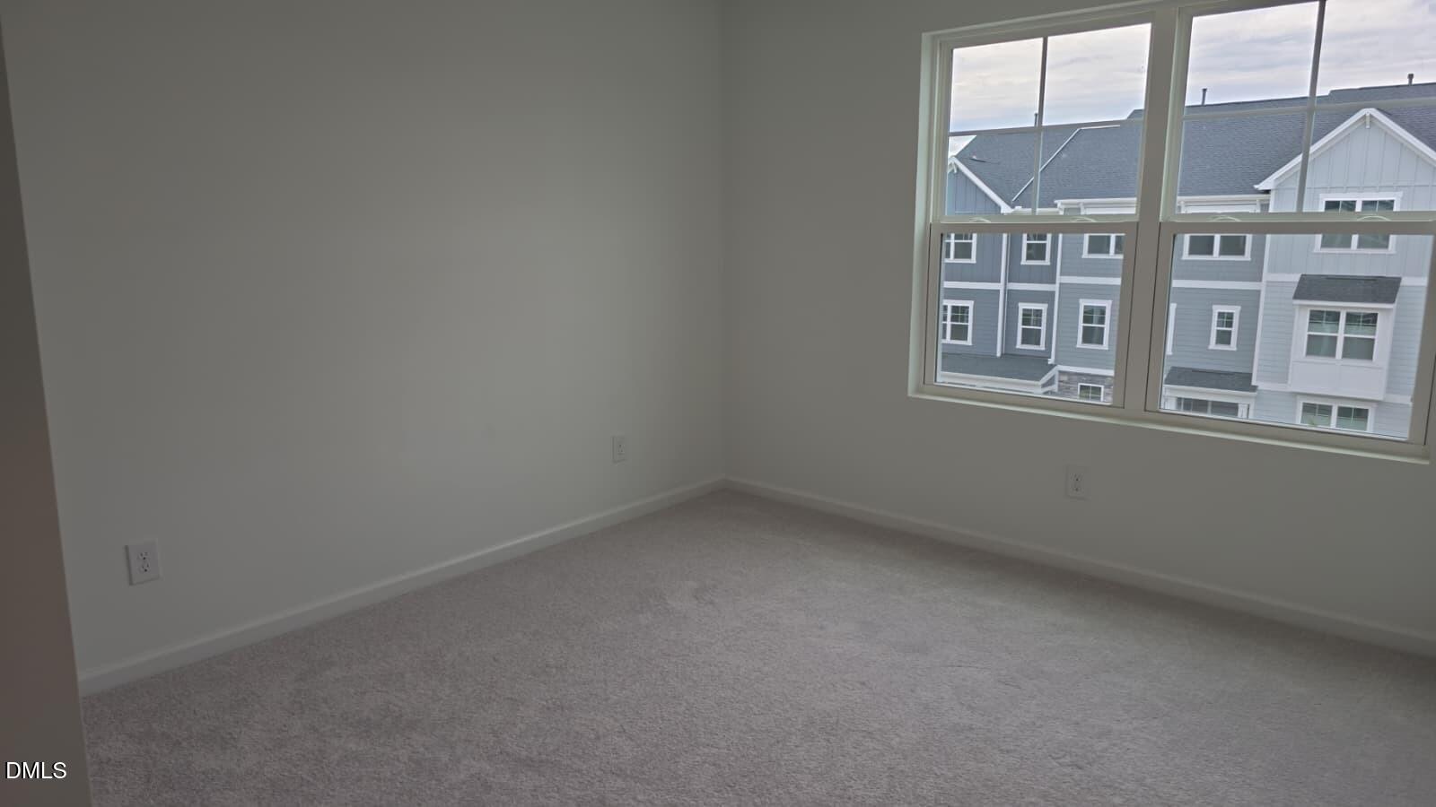1443 Jay Road Knightdale, NC 27545 - Photo 24 of 46 an empty room with a window