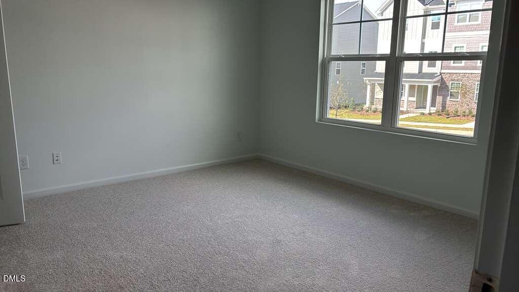 1443 Jay Road Knightdale, NC 27545 - Photo 34 of 46 an empty room with a window