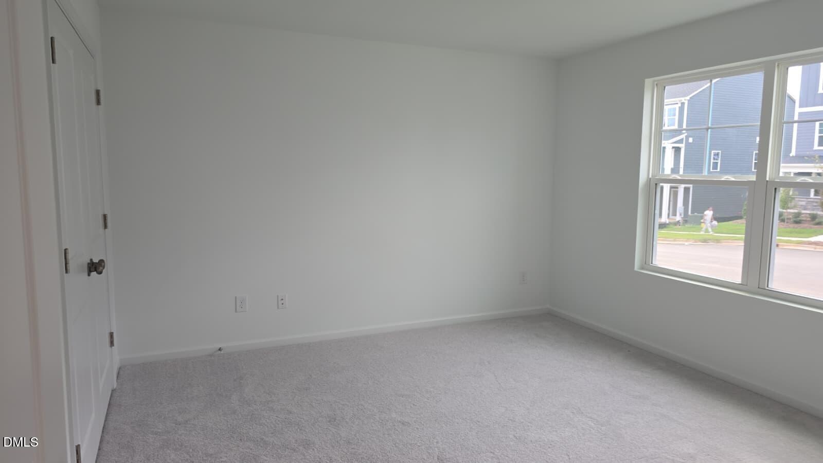 1443 Jay Road Knightdale, NC 27545 - Photo 7 of 46 a view of an empty room with a window