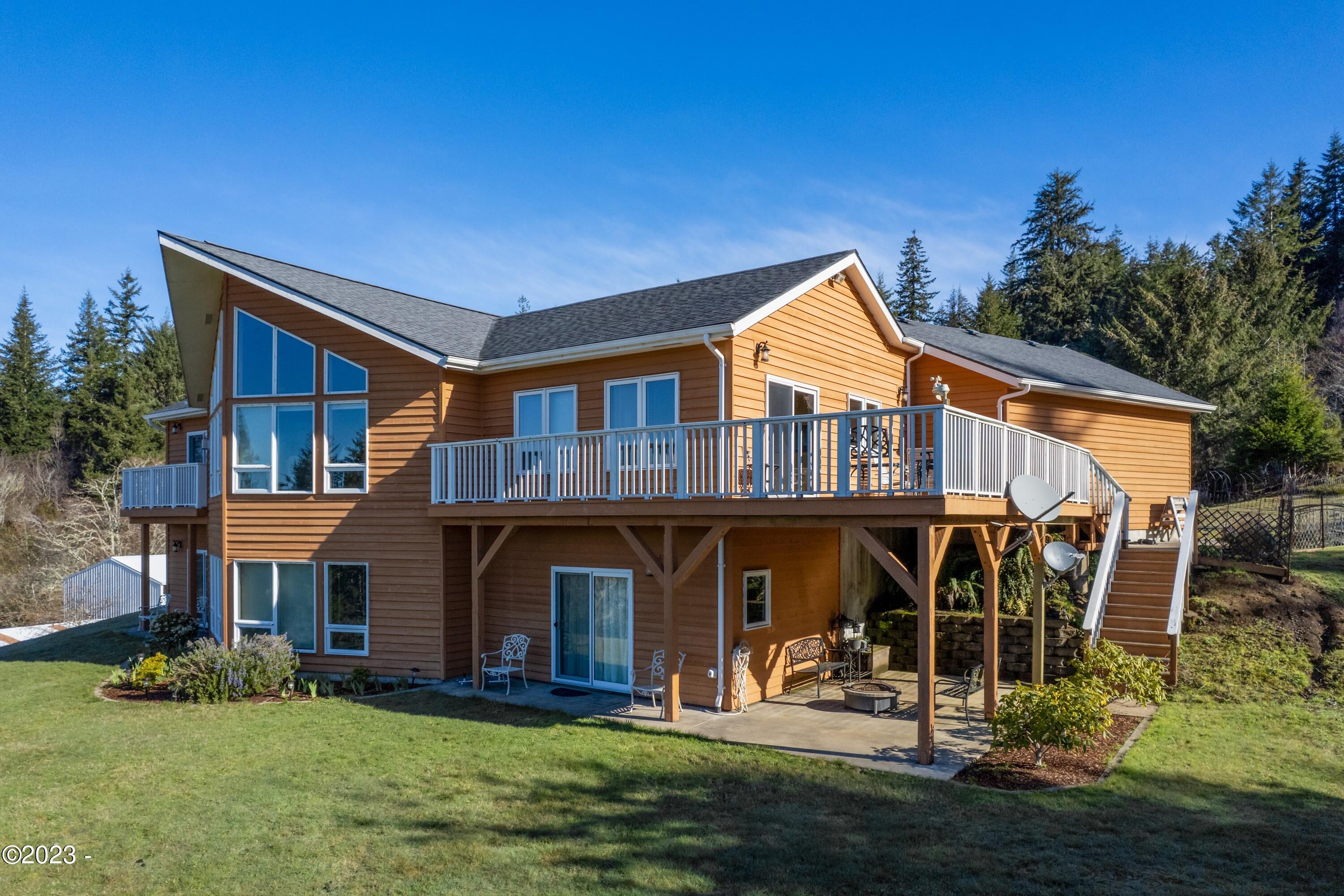 7555 Yaquina Bay Road Newport, OR 97365 - Photo 6 of 54 Side of House