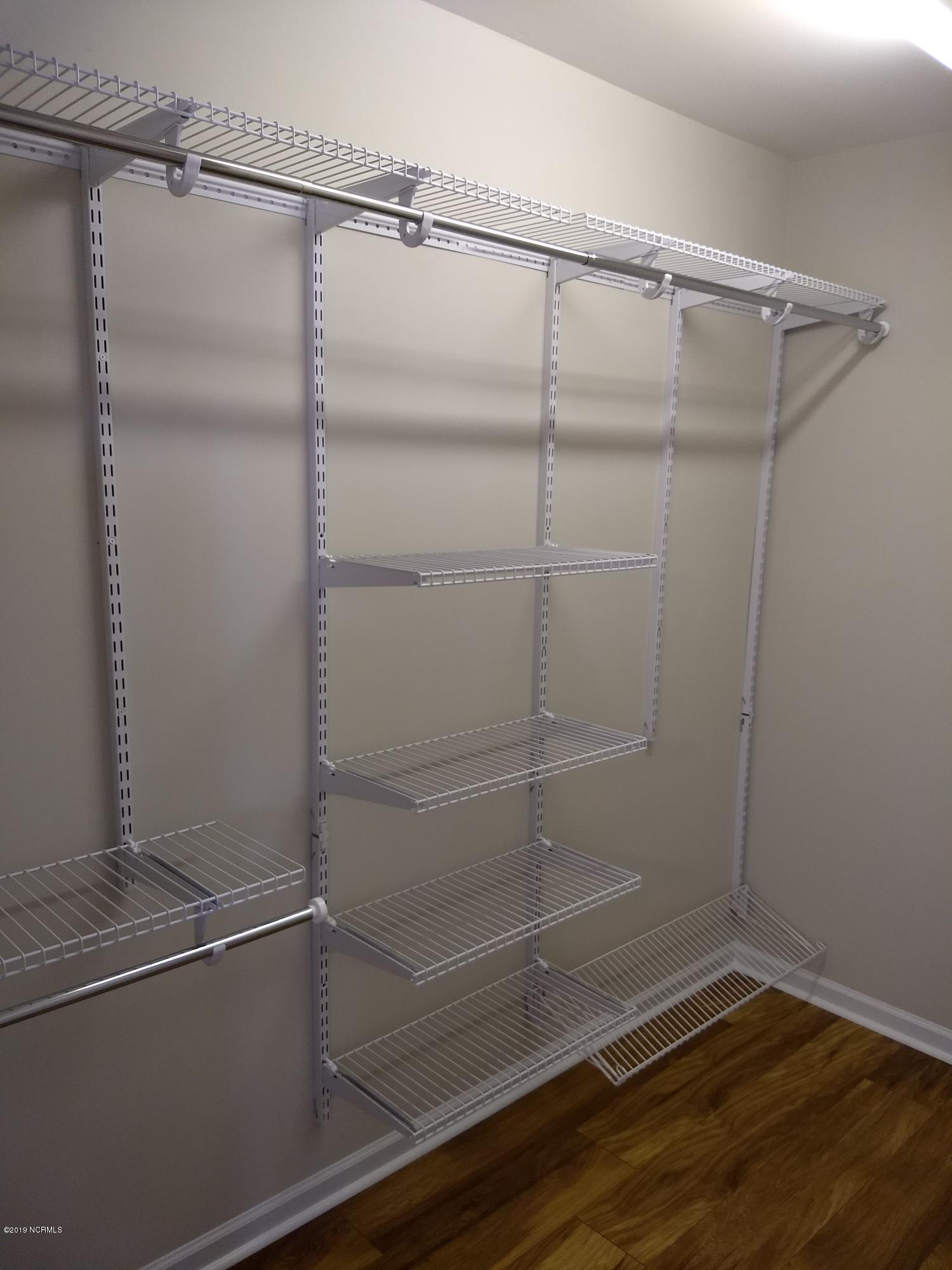 156 Lewis Road Hampstead, NC 28443 - Photo 14 of 21 Master walk in closet