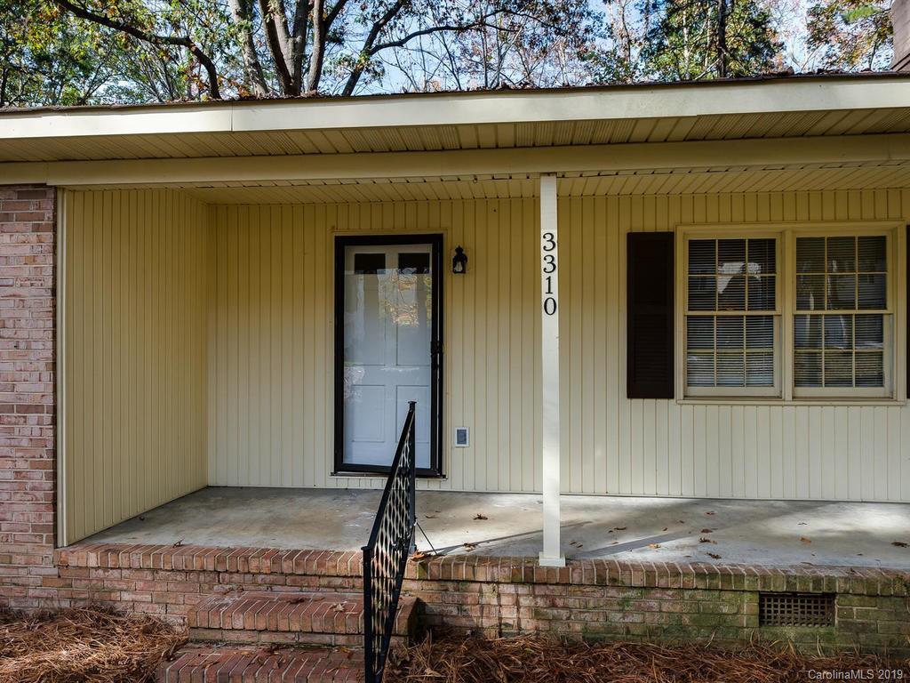 3310 Silver Stream Road, Unit 3310 Charlotte, NC 28226 - Photo 2 of 17 a front view of a house with a yard