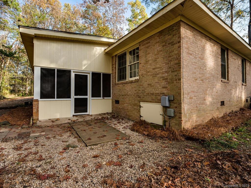 3310 Silver Stream Road, Unit 3310 Charlotte, NC 28226 - Photo 15 of 17 a view of a house with a yard