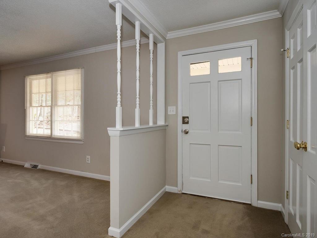 3310 Silver Stream Road, Unit 3310 Charlotte, NC 28226 - Photo 3 of 17 an empty room with windows