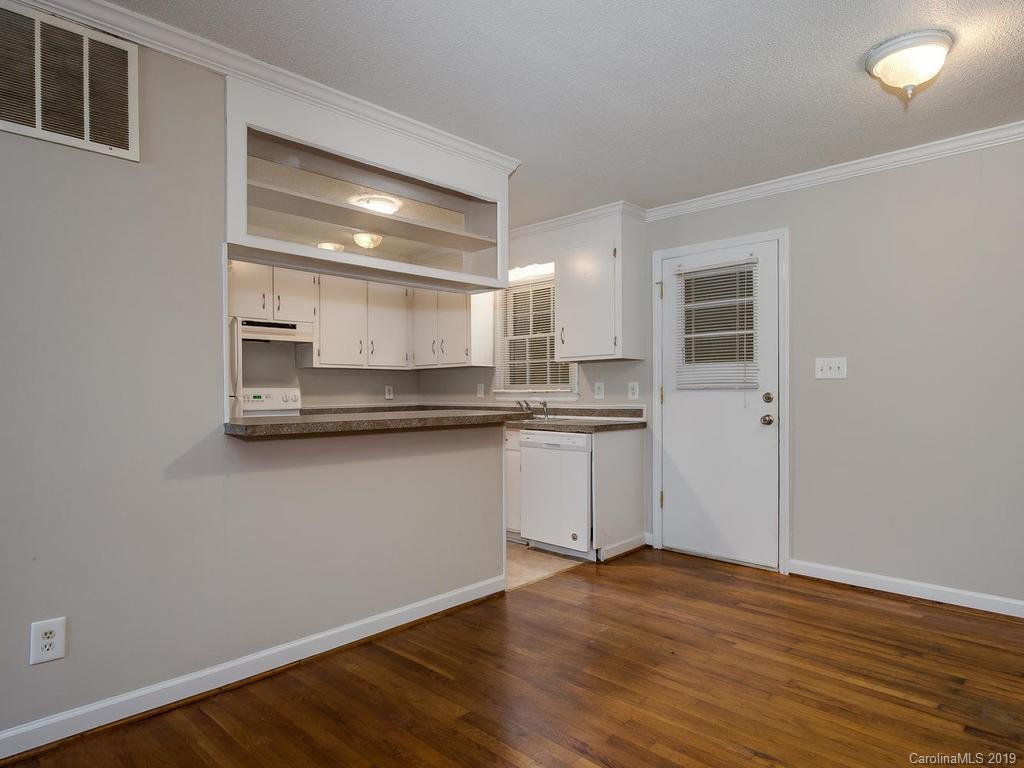 3310 Silver Stream Road, Unit 3310 Charlotte, NC 28226 - Photo 6 of 17 a kitchen with stainless steel appliances granite countertop a refrigerator and a sink