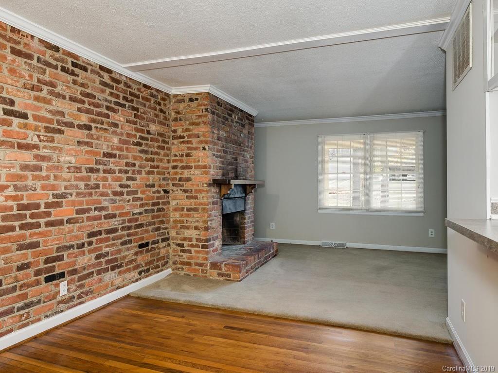 3310 Silver Stream Road, Unit 3310 Charlotte, NC 28226 - Photo 10 of 17 a view of empty room with wooden floor and fan