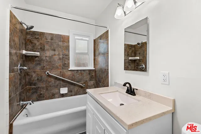 a bathroom with a sink and a bathtub