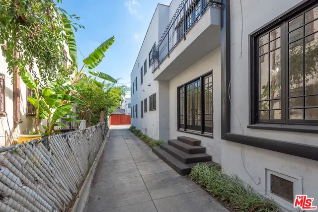 a house with trees in front of it