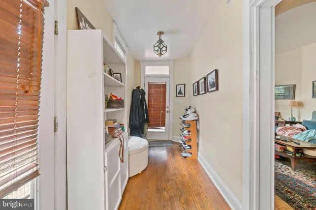 a kitchen with stainless steel appliances granite countertop a sink a stove and cabinets