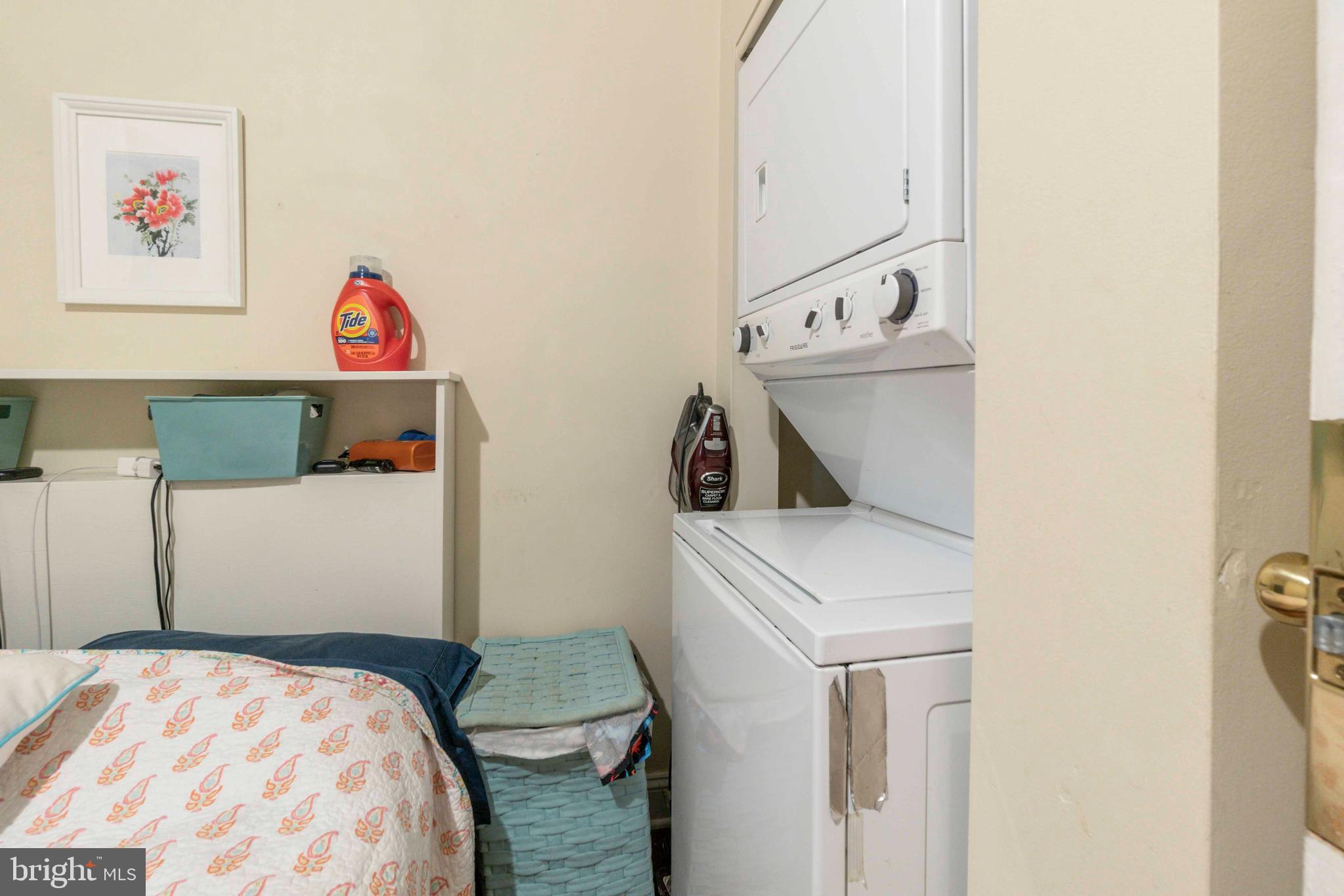 5009 Roland Avenue Baltimore, MD 21210 - Photo 16 of 35 a bedroom with a bed and a cabinets