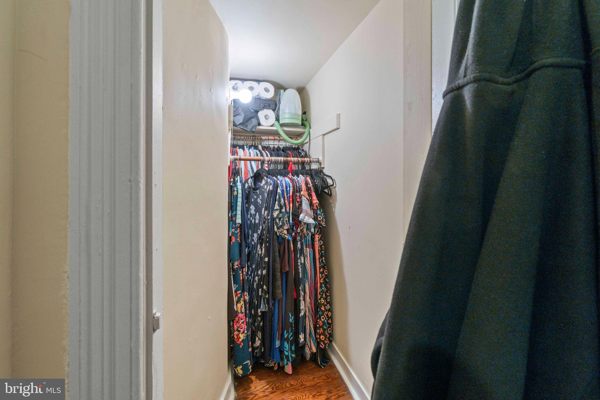 5009 Roland Avenue Baltimore, MD 21210 - Photo 17 of 35 a view of walk in closet with clothes