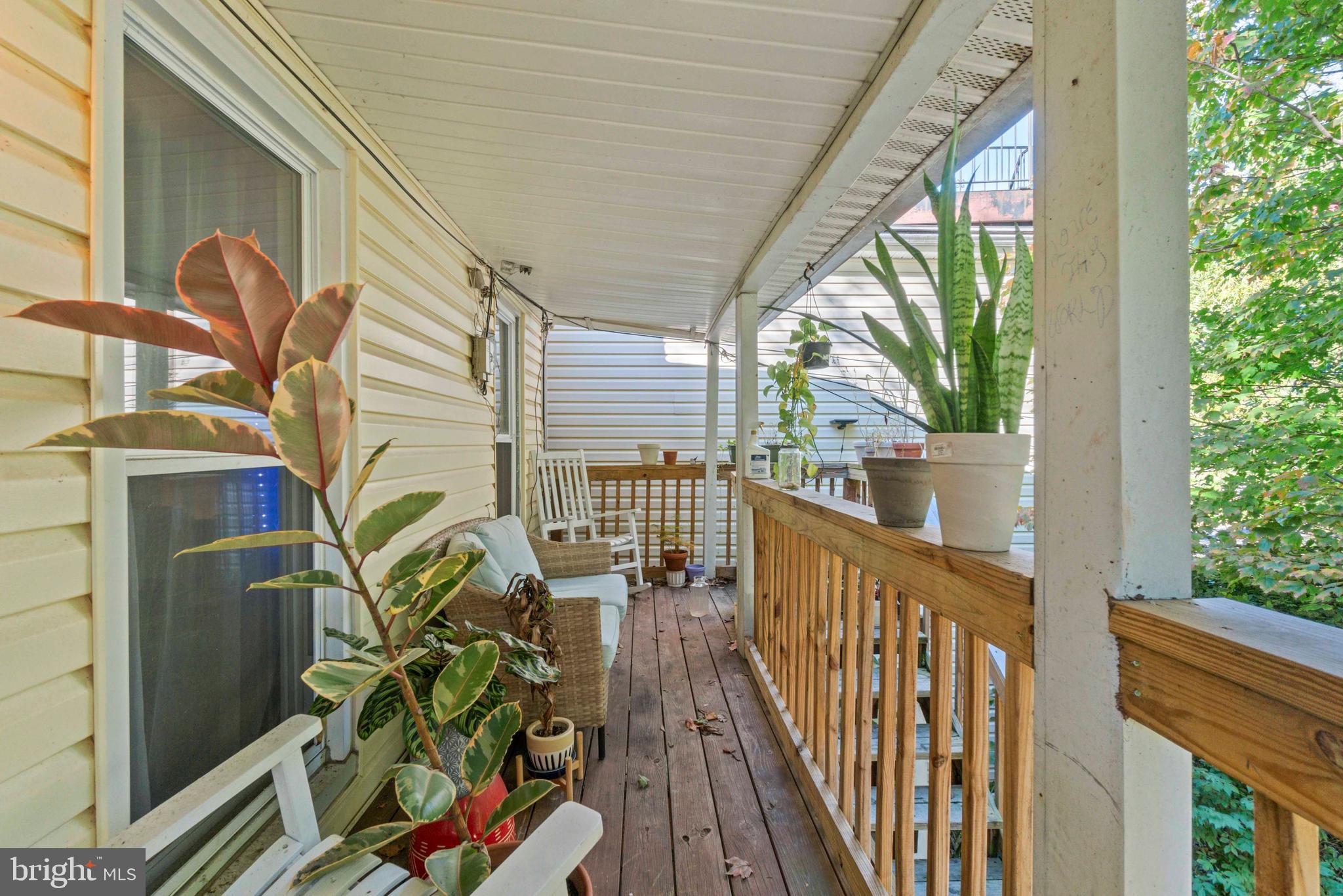 5009 Roland Avenue Baltimore, MD 21210 - Photo 28 of 35 a view of balcony with wooden floor
