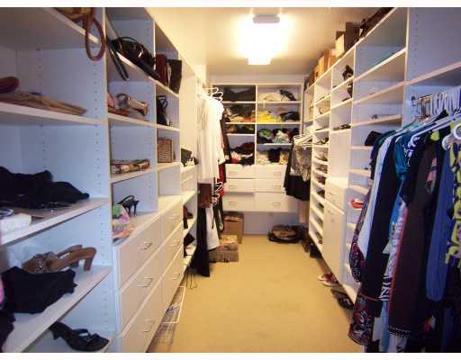 62 South River Road Stuart, FL 34996 - Photo 7 of 7 a view of walk in closet with clothes and shoes