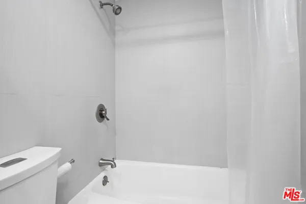 a view of bathroom with a toilet