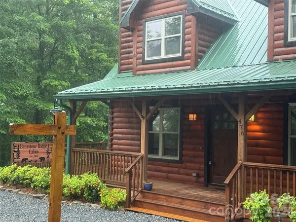 a front view of a house with a porch