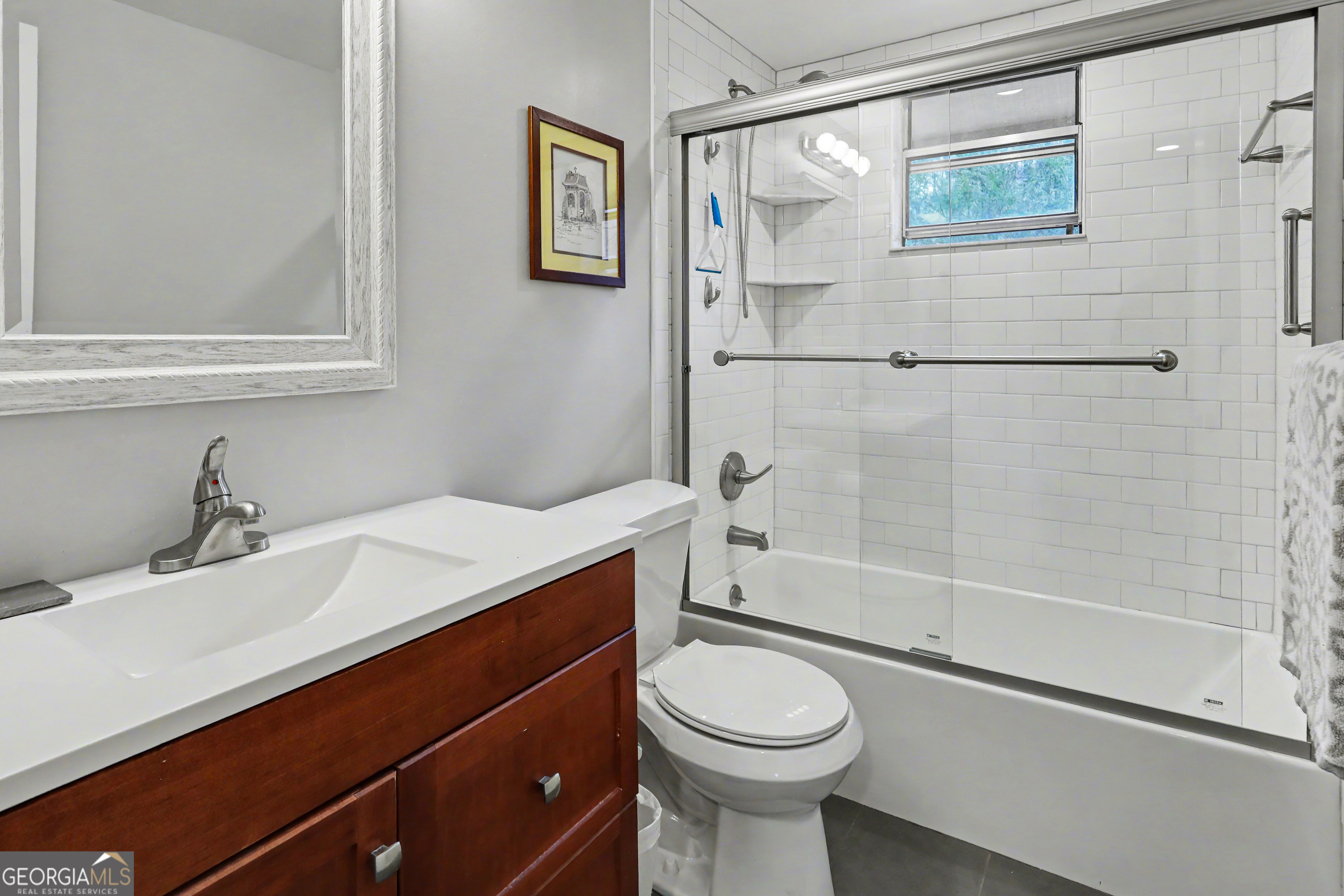 559 Maple Leaf Drive Dillard, GA 30537 - Photo 16 of 49 a bathroom with a sink a toilet and shower