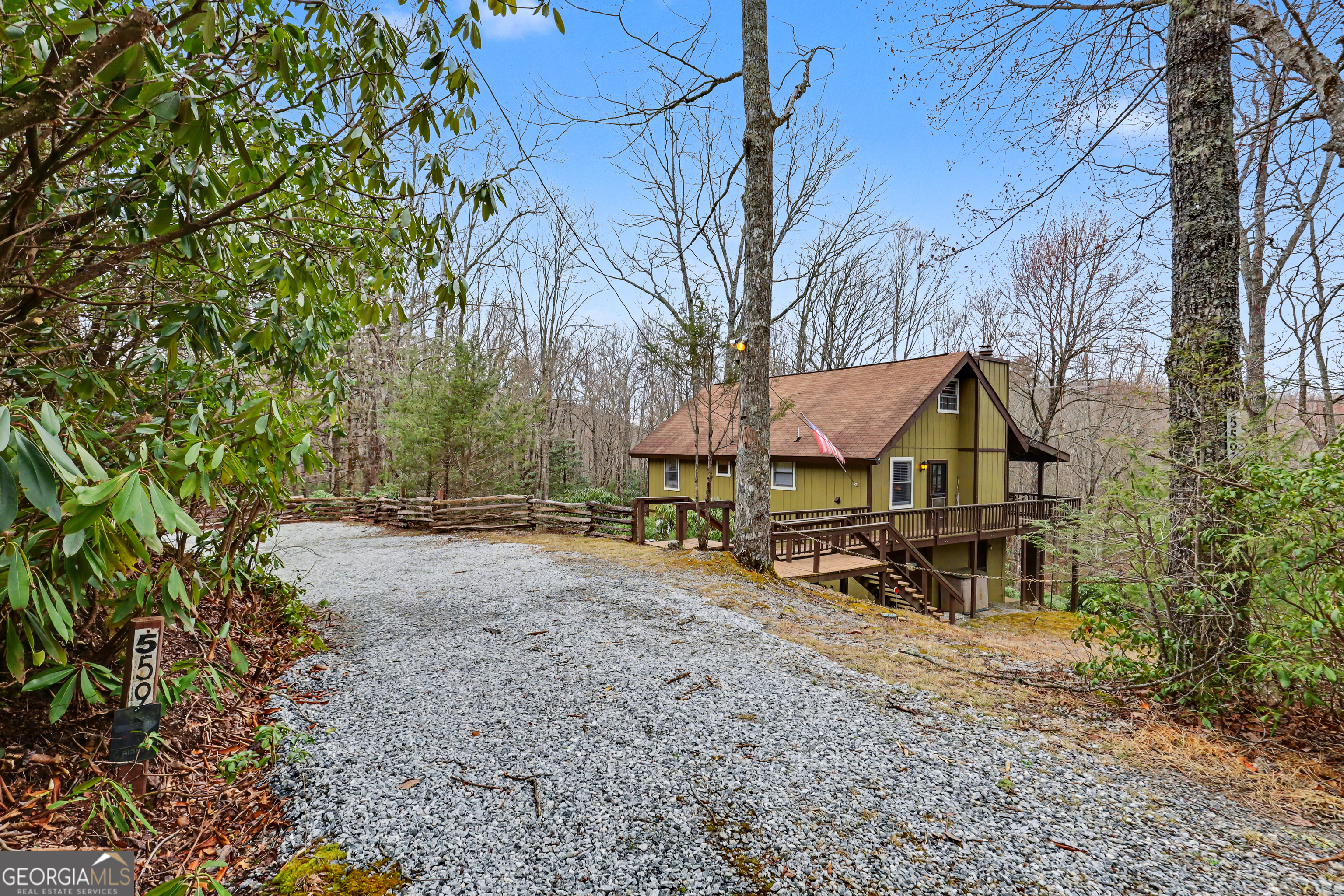 559 Maple Leaf Drive Dillard, GA 30537 - Photo 2 of 49 a view of a house with a yard