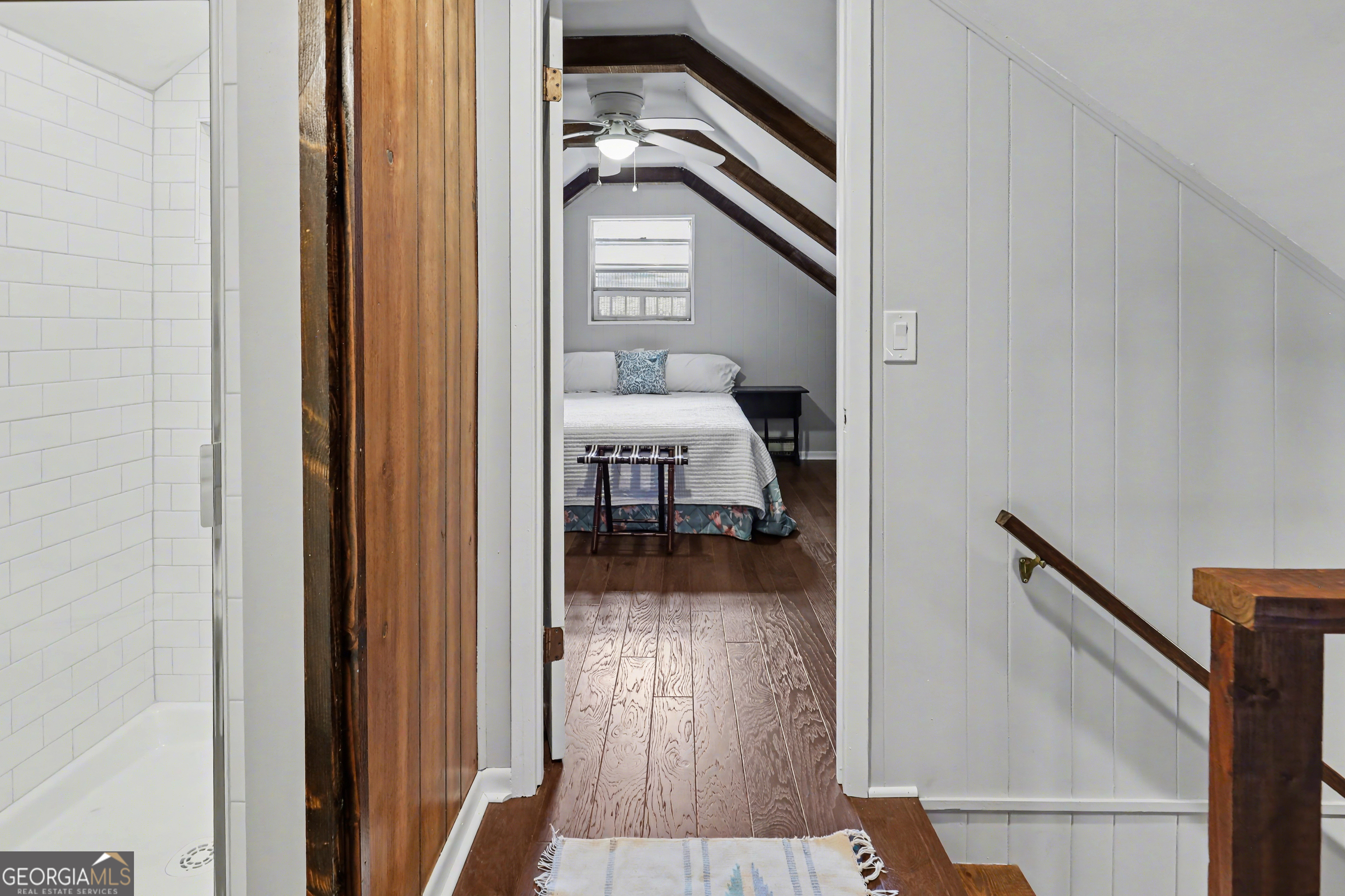 559 Maple Leaf Drive Dillard, GA 30537 - Photo 23 of 49 a view of a hallway with wooden floor and staircase