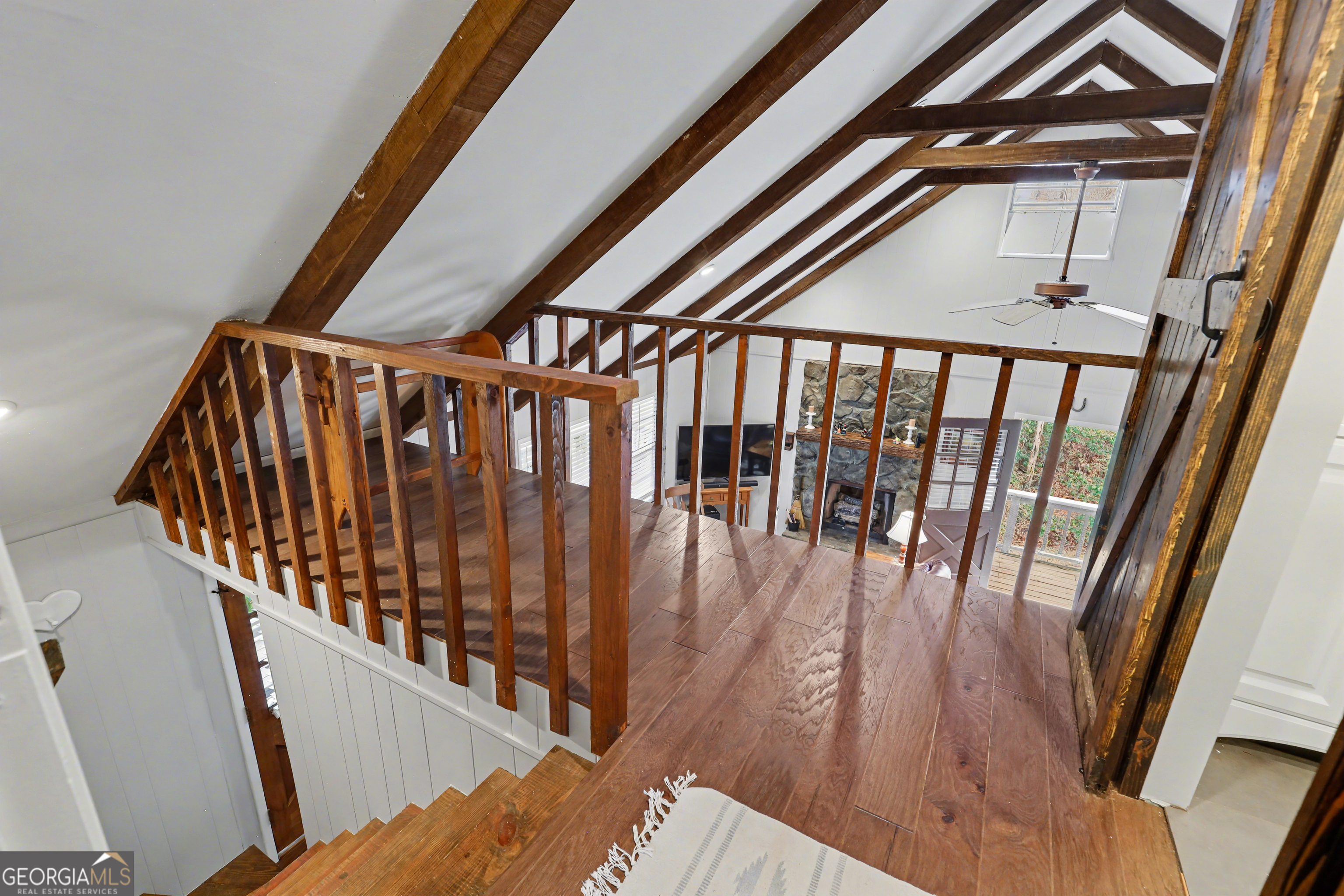 559 Maple Leaf Drive Dillard, GA 30537 - Photo 26 of 49 a view of staircase with railing and stairs