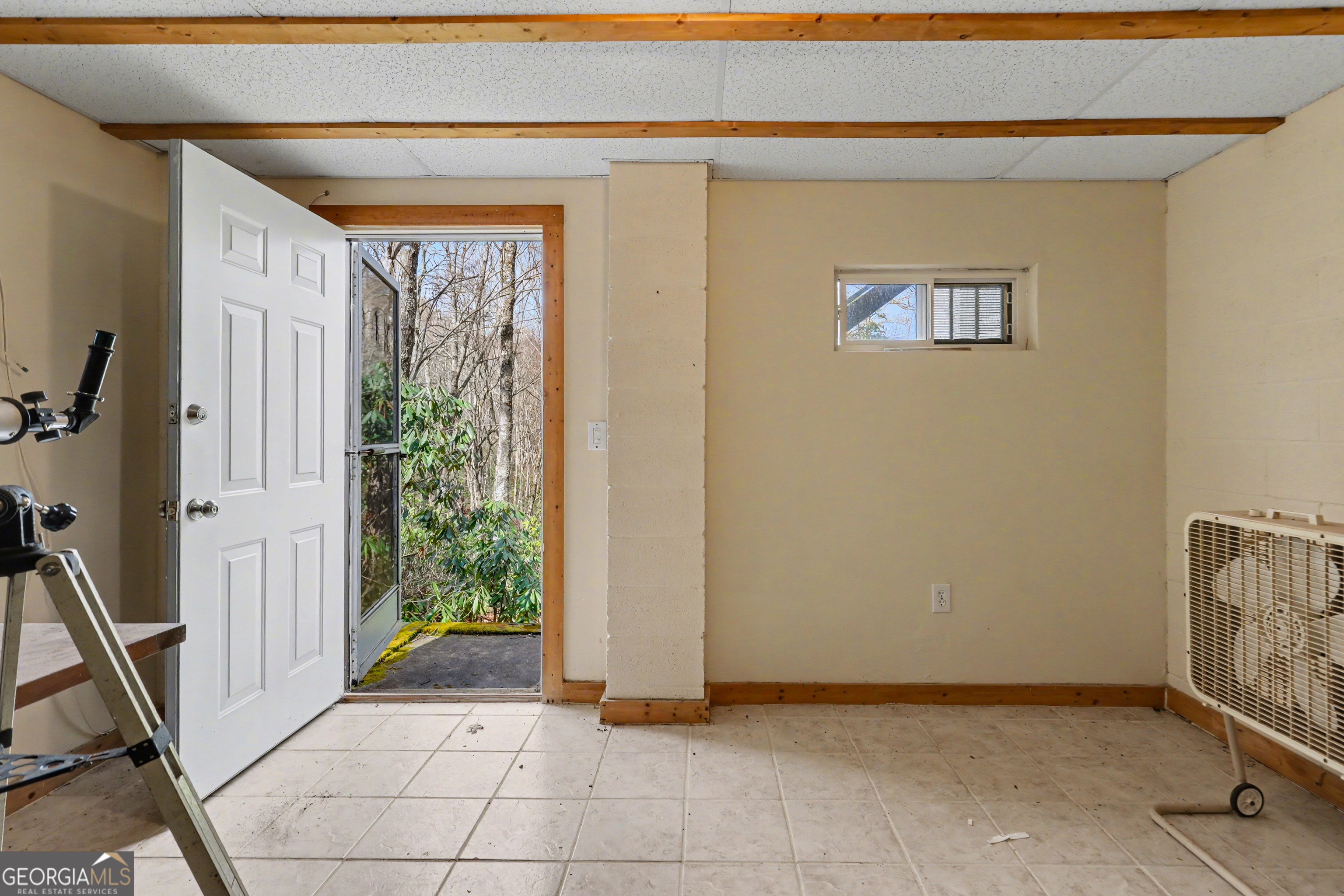 559 Maple Leaf Drive Dillard, GA 30537 - Photo 34 of 49 a view of an empty room and a window