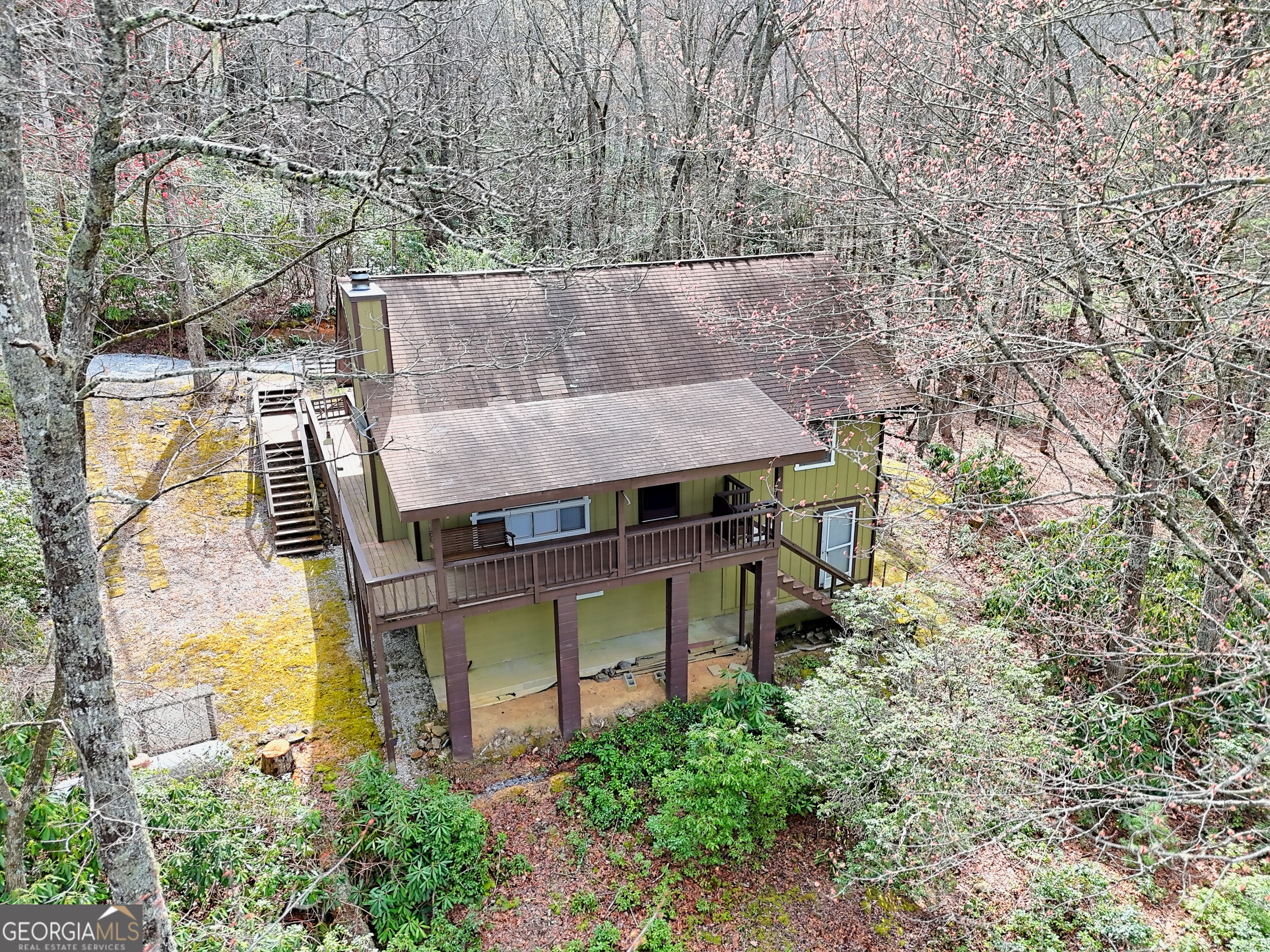 559 Maple Leaf Drive Dillard, GA 30537 - Photo 42 of 49 an aerial view of a house with swimming pool and large trees