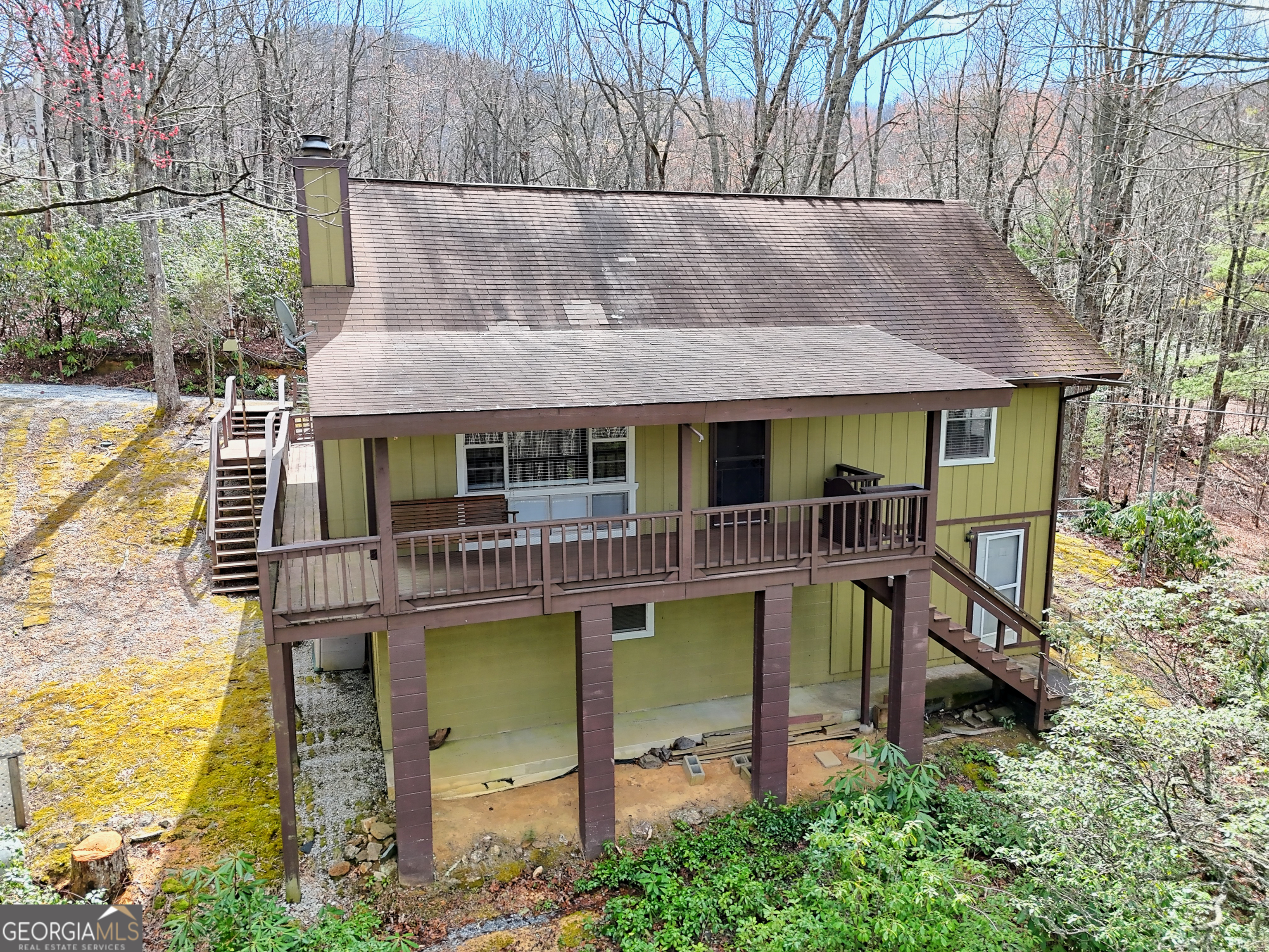 559 Maple Leaf Drive Dillard, GA 30537 - Photo 43 of 49 an aerial view of a house with swimming pool next to a yard