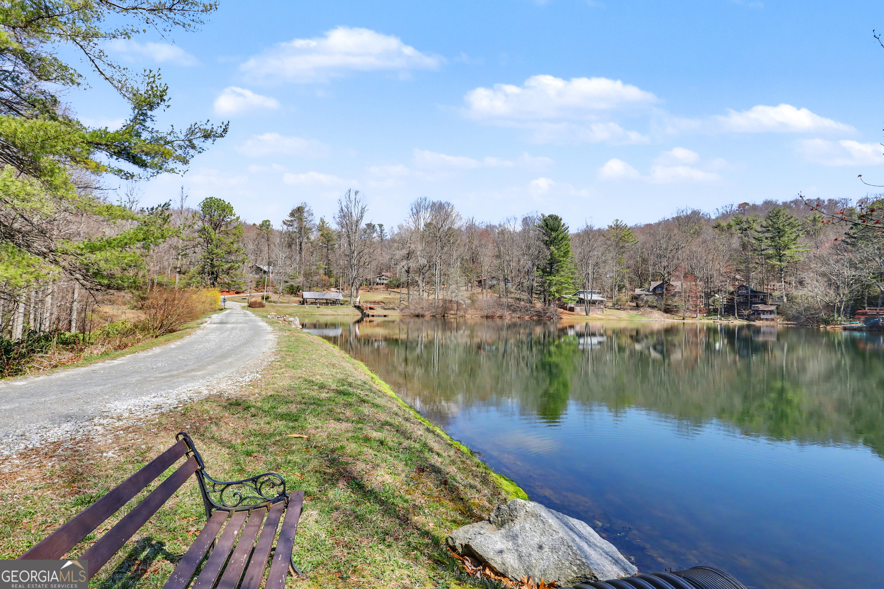 559 Maple Leaf Drive Dillard, GA 30537 - Photo 49 of 49 a view of a lake with houses in the back