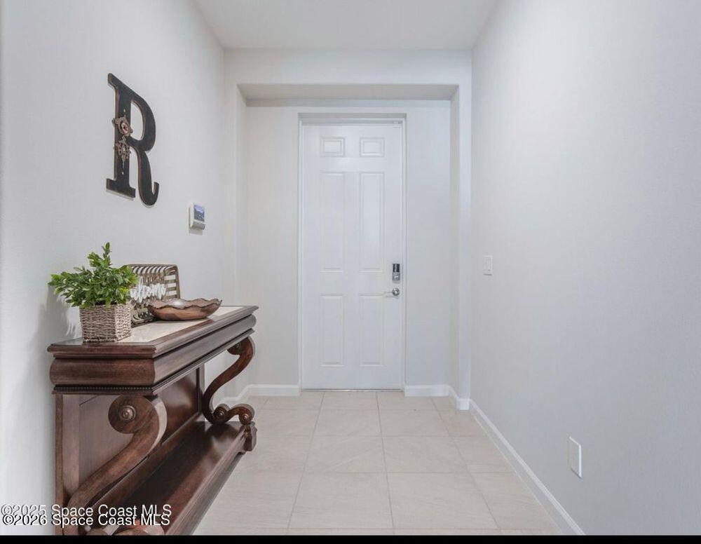 2792 Pinwherry Street Palm Bay, FL 32907 - Photo 4 of 19 a view of workspace with a window