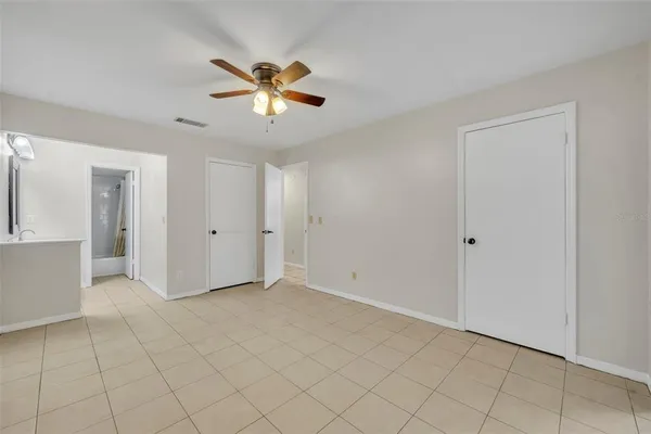 a view of an empty room and window