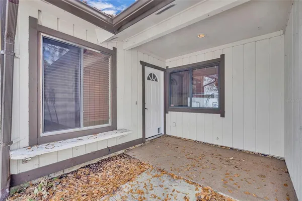 a view of a house with a wooden door