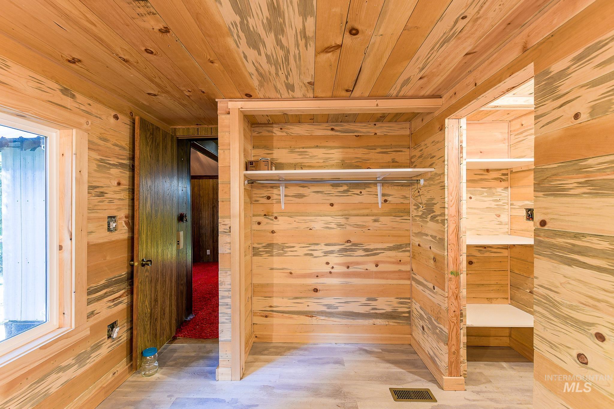 1206 Idlers Rest Road Moscow, ID 83843 - Photo 17 of 47 Room featuring light-toned wood paneling on walls and ceiling