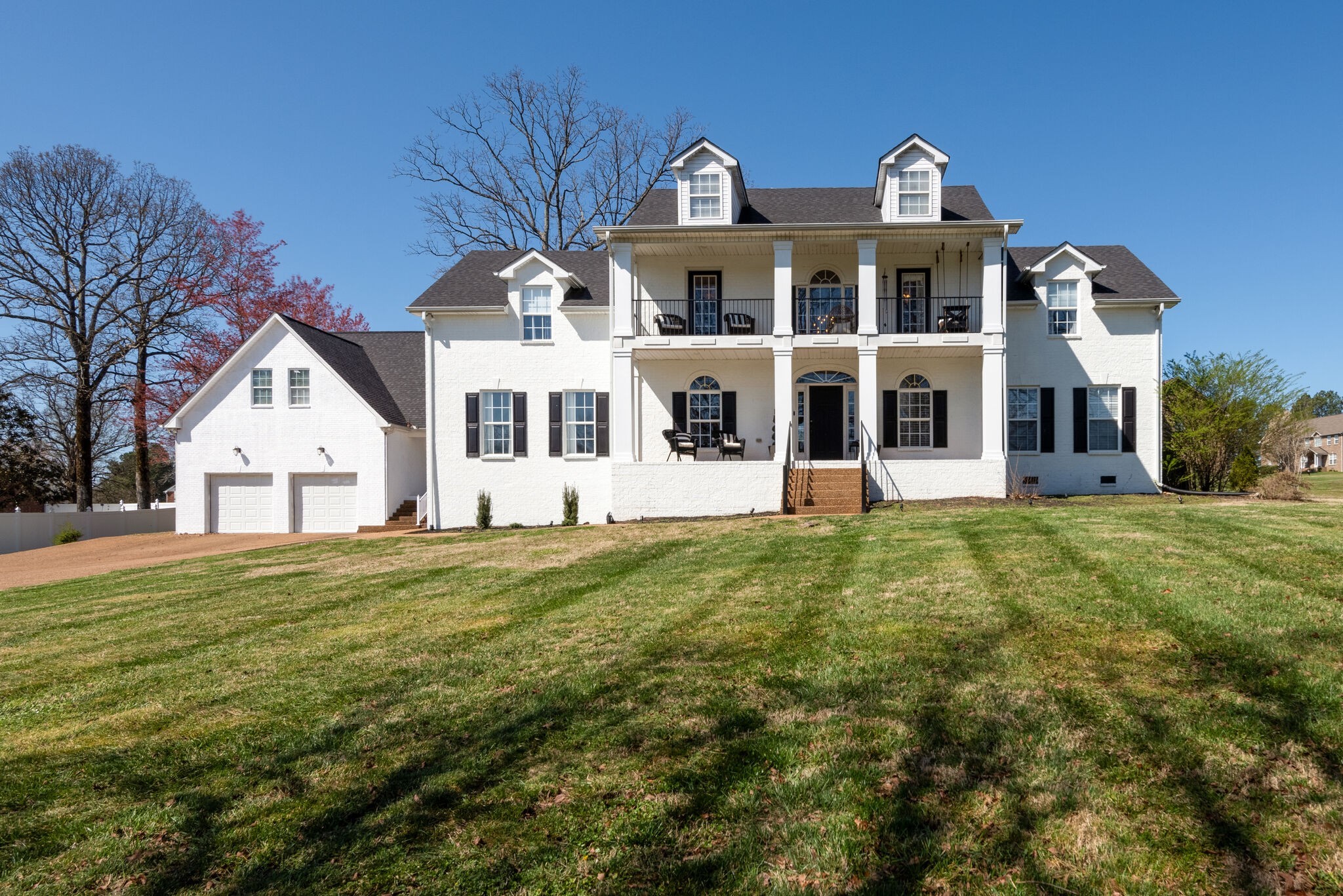 111 Meadowood Loop Burns, TN 37029 - Photo 1 of 73 a front view of a house with a yard