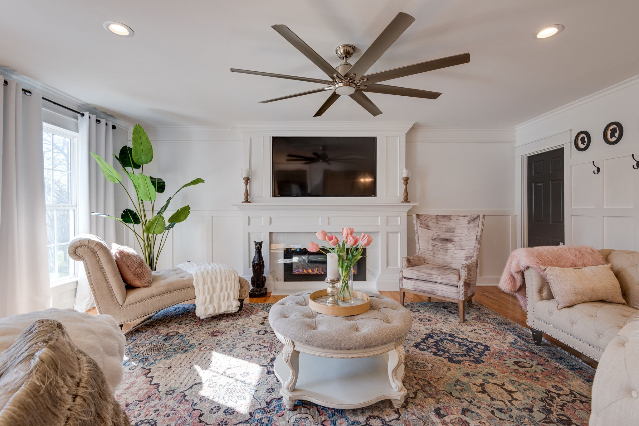 111 Meadowood Loop Burns, TN 37029 - Photo 11 of 73 a living room with furniture a flat screen tv and a fireplace