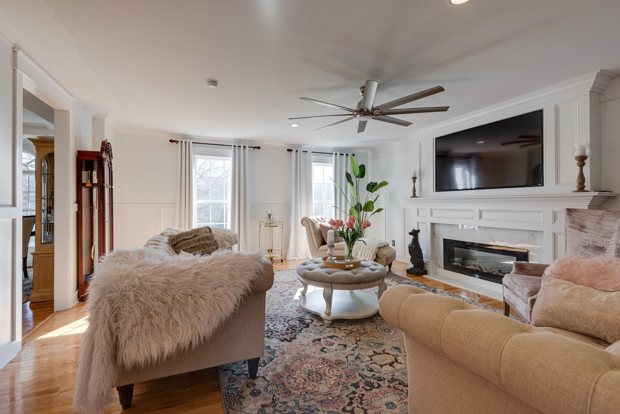111 Meadowood Loop Burns, TN 37029 - Photo 12 of 73 a living room with furniture a fireplace and a flat screen tv